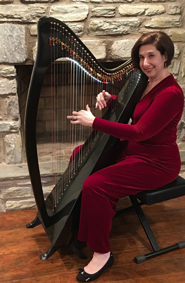 cheryl playing harp